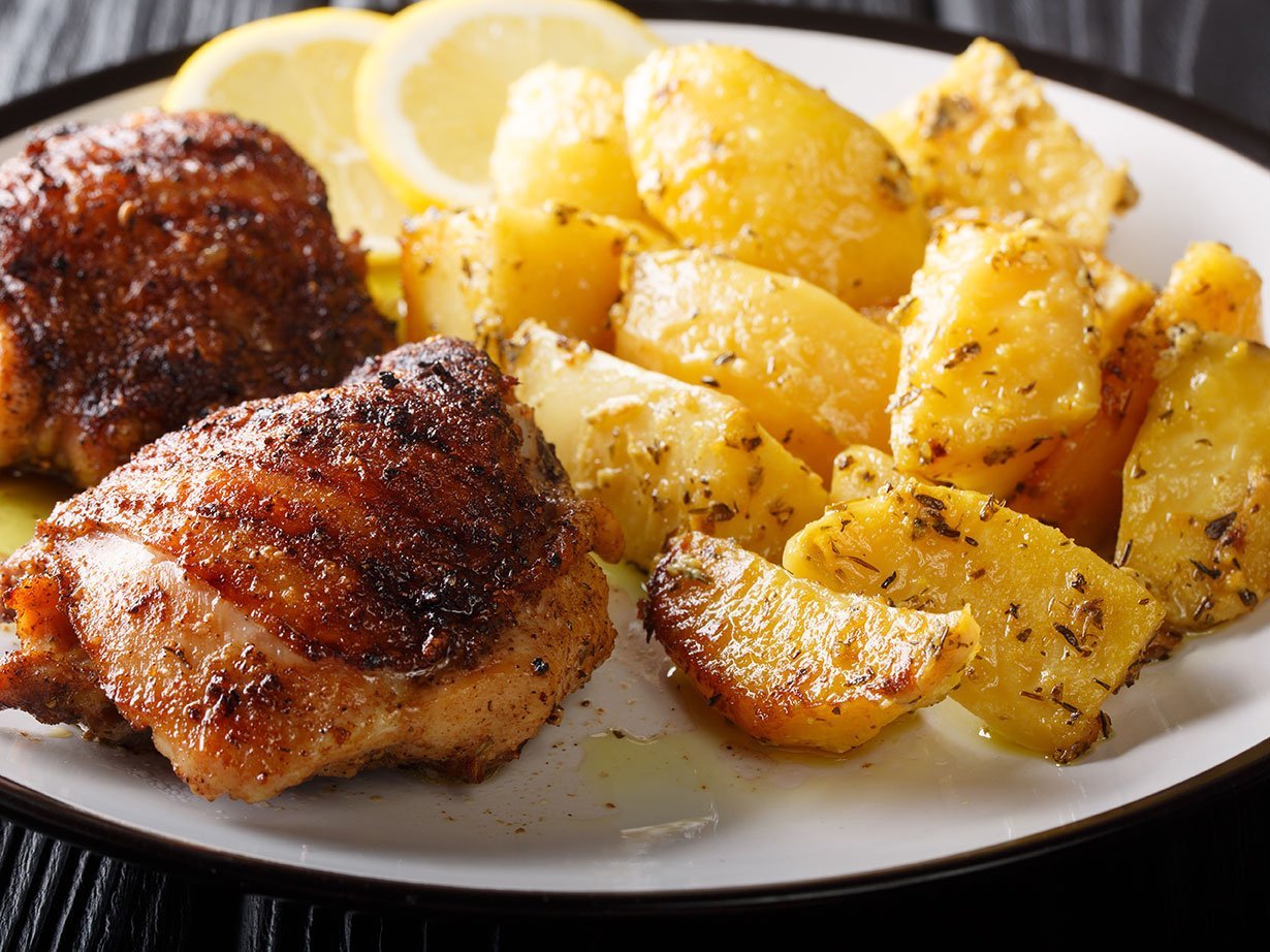 Grilled Chicken Thighs Served With Delicious Lemon Garlic Potato