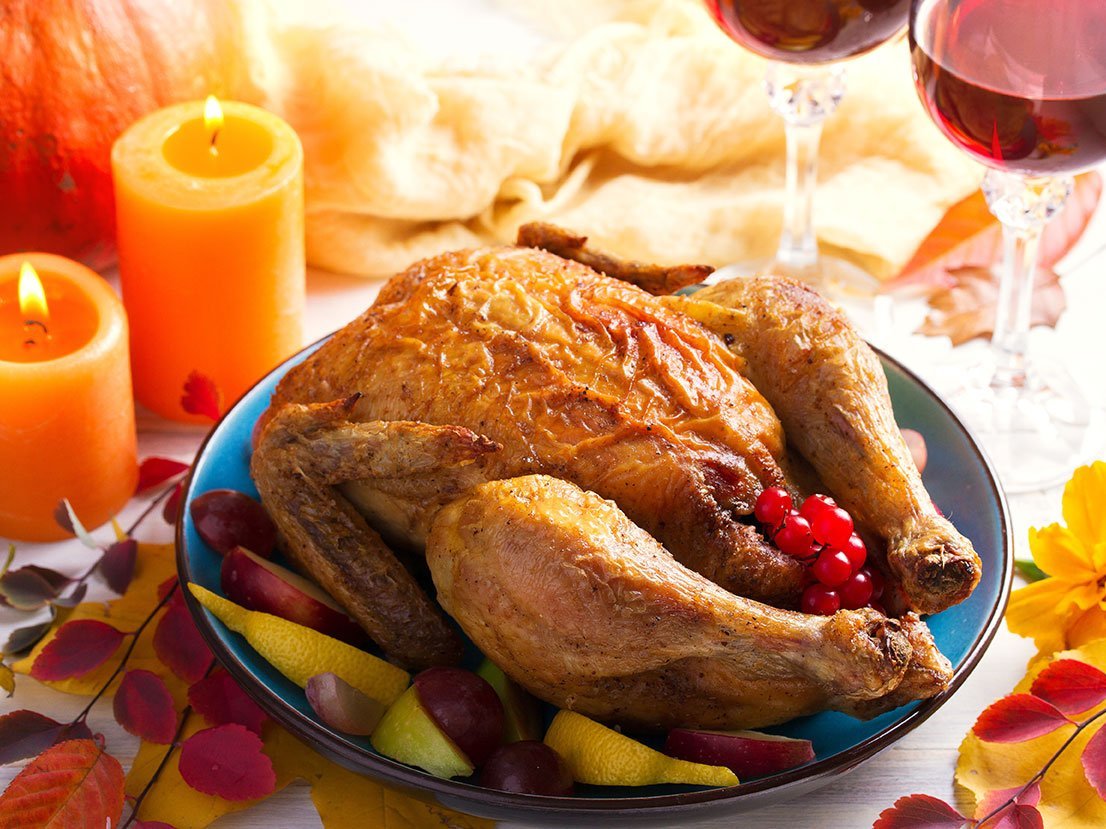 Roast Chicken Or Turkey. Autumn Decorations, Fruits, Pumpkin And Berries On The Table. Thankgiving Dinner