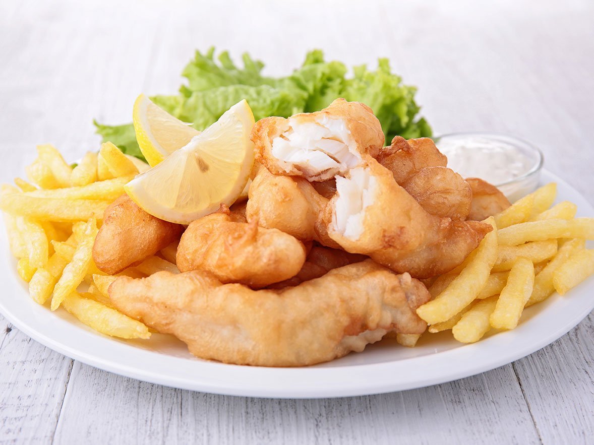 Fish And Chips With Salad And Sauce