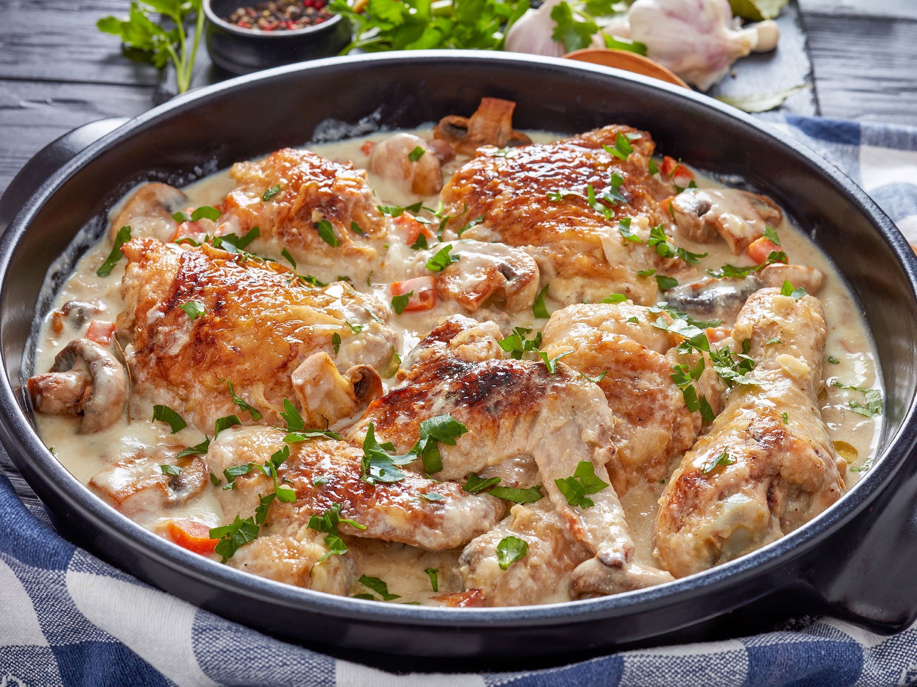 Hot Chicken Fricassee In A Black Dutch Oven