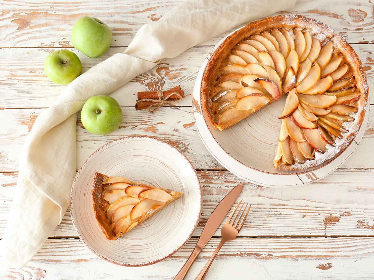 Tasty Apple Pie On White Wooden Table