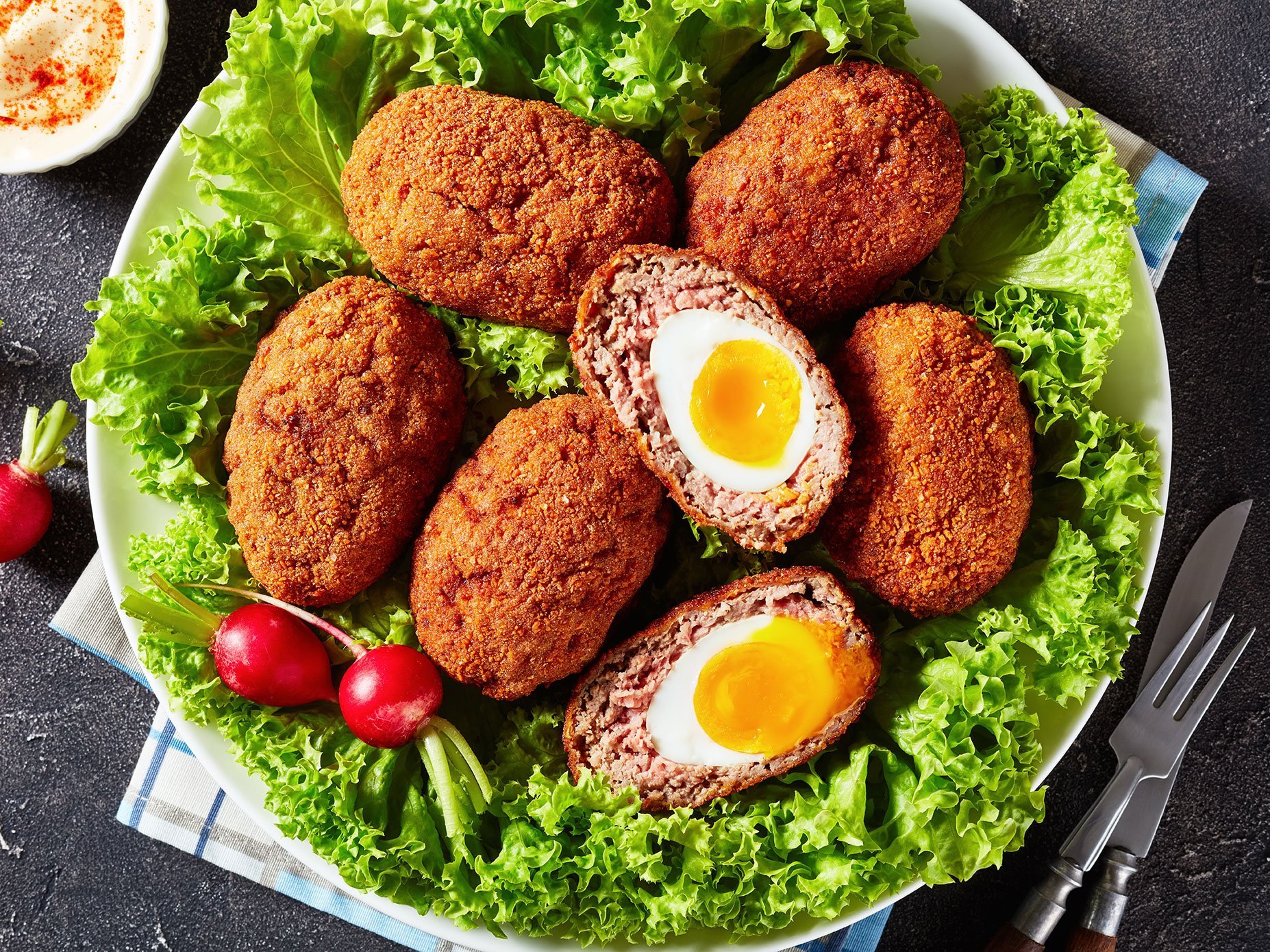 Traditional Fried Scotch Eggs On A Platter