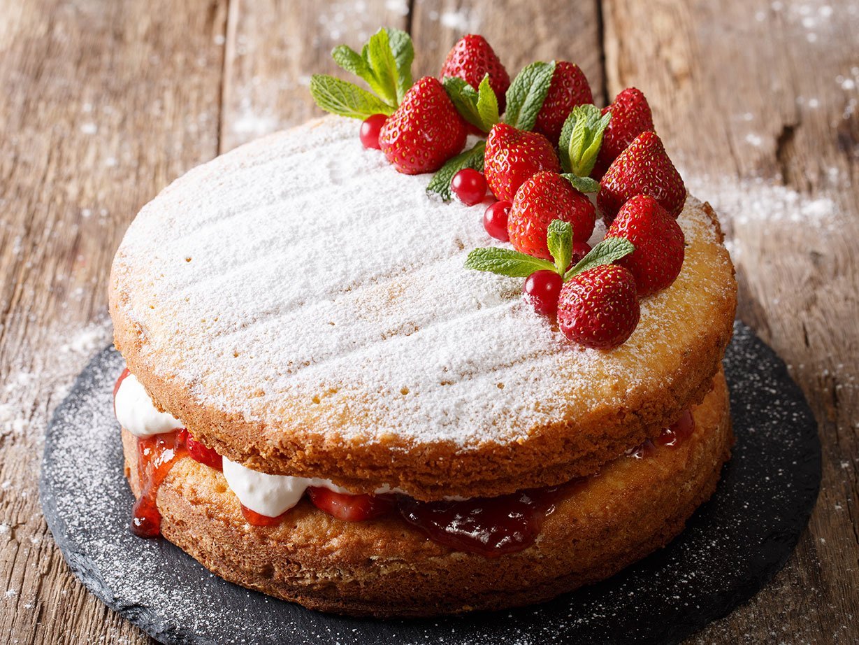 Home Victoria Sponge Cake, Decorated With Strawberries And Mint