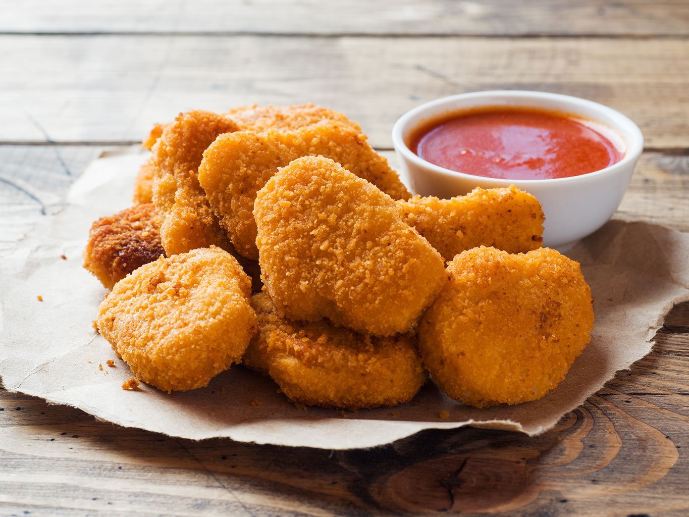 Chicken Nuggets With Tomato Sauce On Wooden Background. Copy Space.