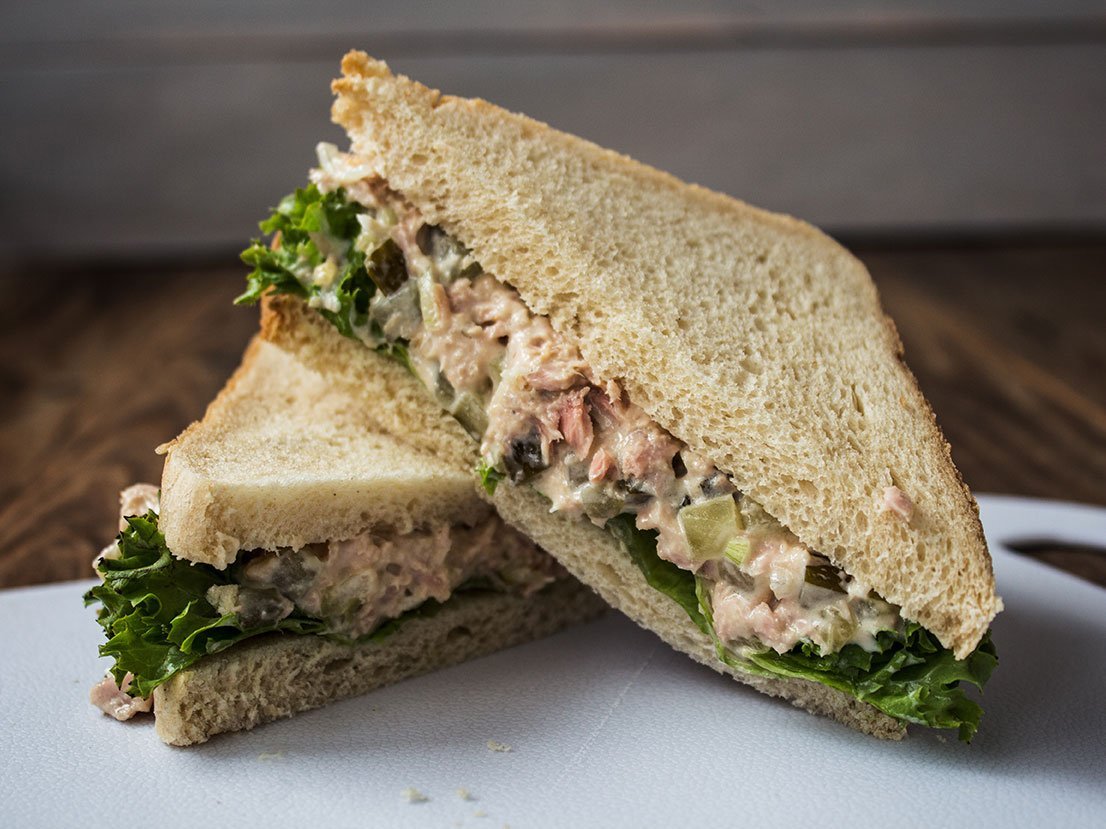 Tuna Pickles Sandwich With Salad On White Plate