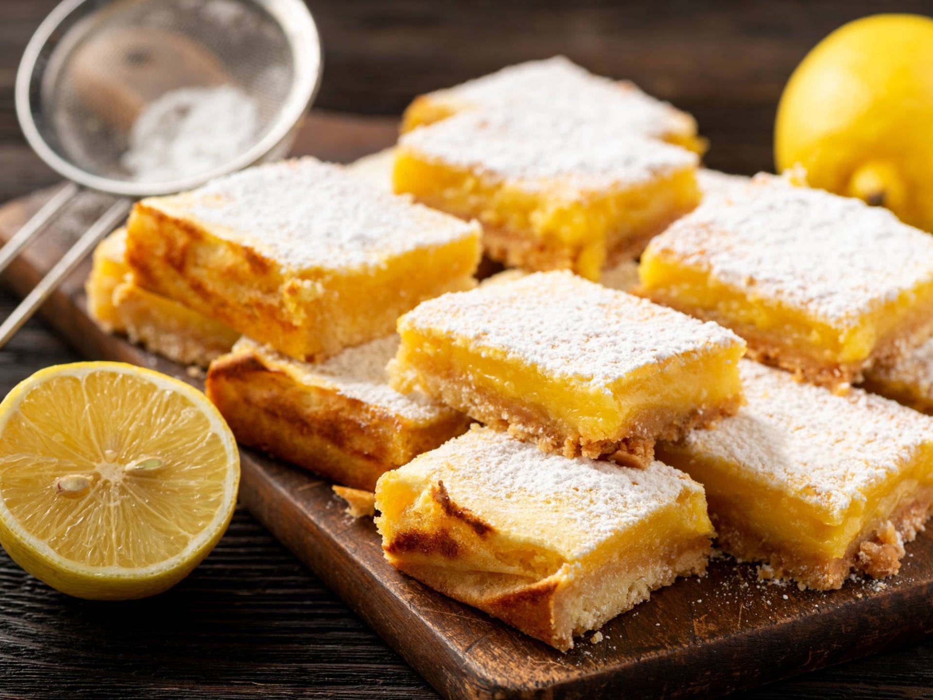 Homemade Lemon Bars With Shortbread Crust, On Wooden Background.