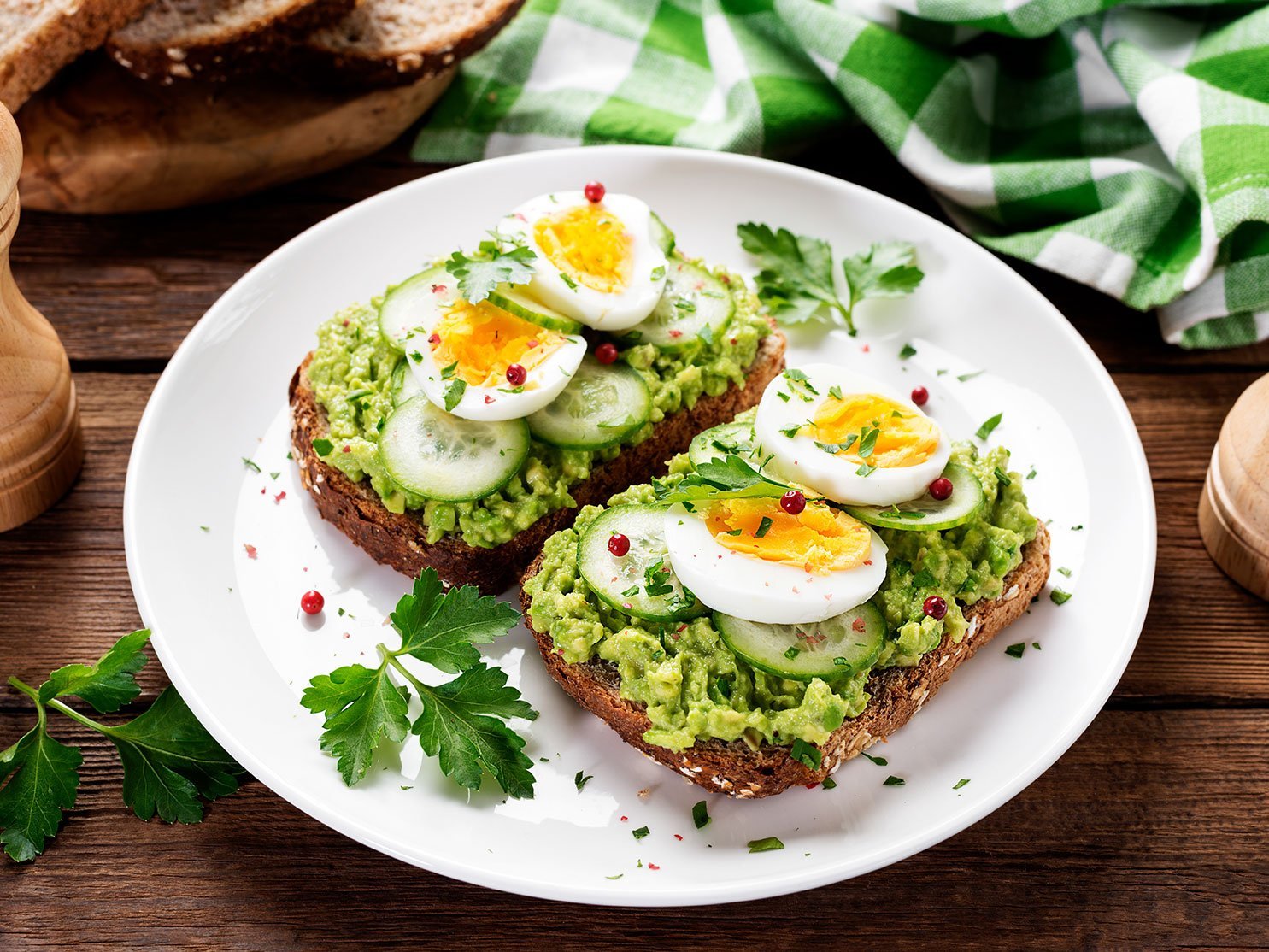 Healthy Breakfast Toast With Avocado Smash And Boiled Egg. Wood