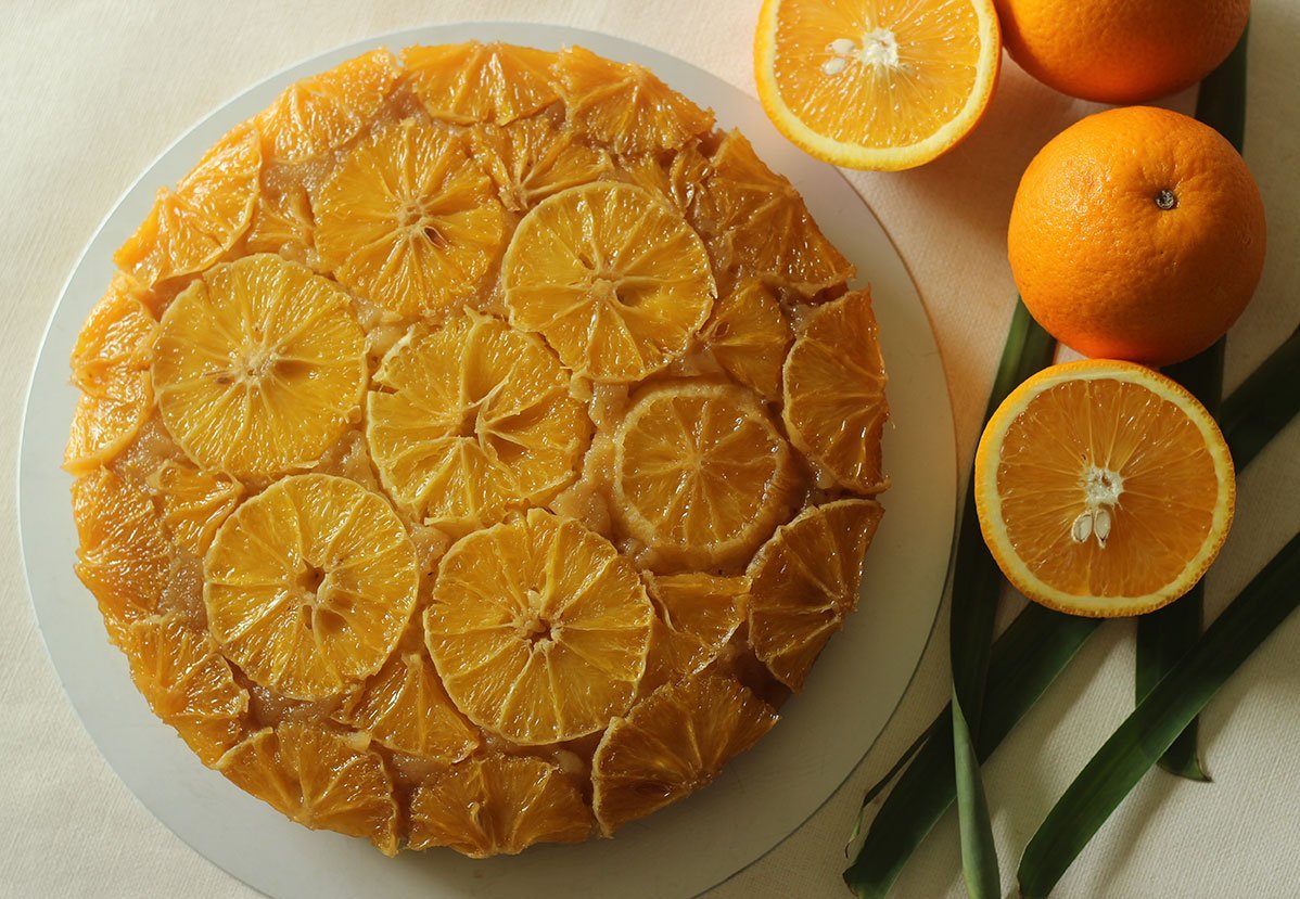 Home Baked Orange Upside Down Cake With Orange Slices On The Top