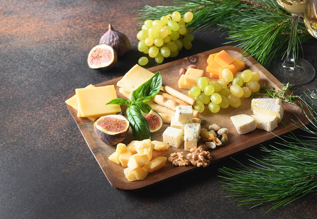 Christmas Ceese Platter With Different Cheese And Appetizer.