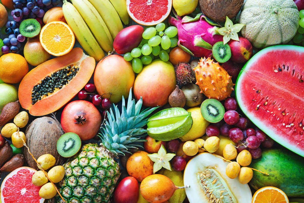 Assortment Of Colorful Ripe Tropical Fruits. Top View