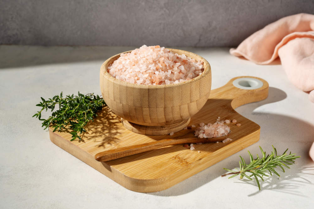 Himalayan Pink Salt, Raw Crystals In Wooden Bowl