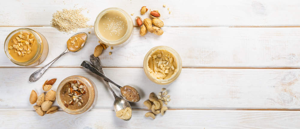 Selection Of Nut Butters Peanut, Cashew, Almond And Sesame Seeds