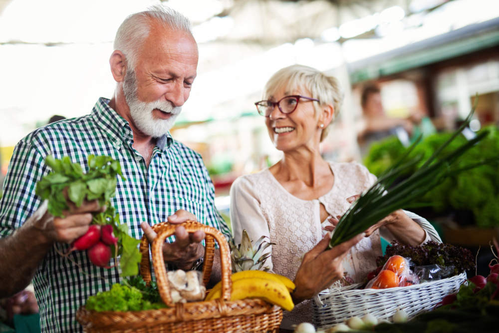 Shopping, Food, Sale, Consumerism And People Concept Happy Senior Couple Buying Fresh Food