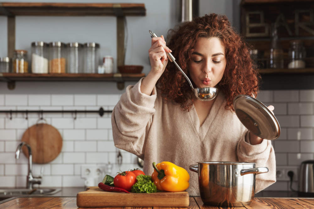 Photo Of Pretty Caucasian Woman Holding Cooking Ladle Spoon Whil