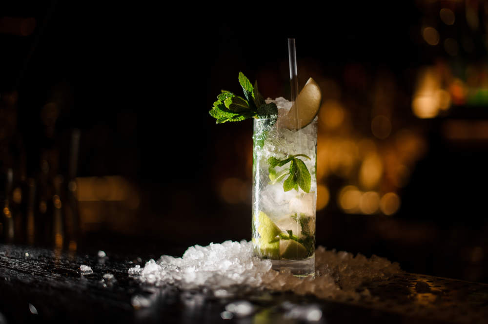 Alcoholic Cocktail Mojito Stands On A Bar Counter