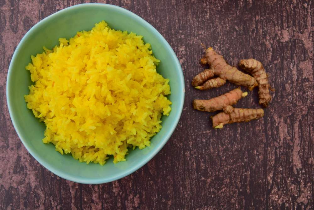 Nasi Kuning Or Turmeric Rice. Indonesian Food