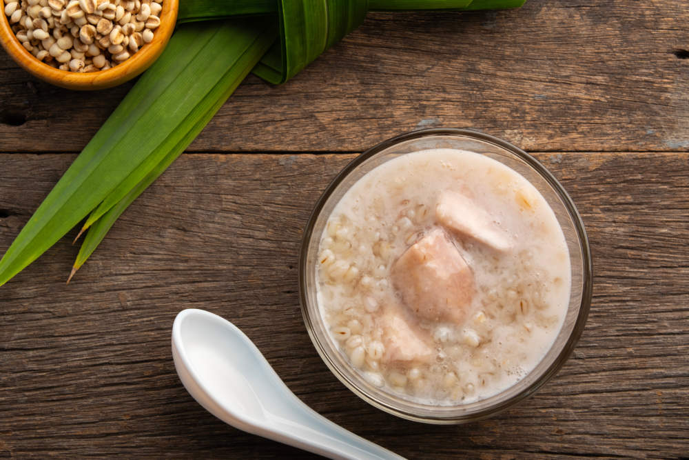 Thai Sweet Job's Tears And Taro Pudding With A Dash Of Coconut Milk In Glass Bowl.thai Dessert