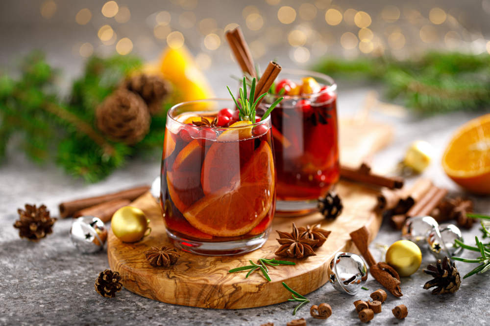 Christmas Mulled Wine. Traditional Xmas Festive Drink With Decorations And Fir Tree